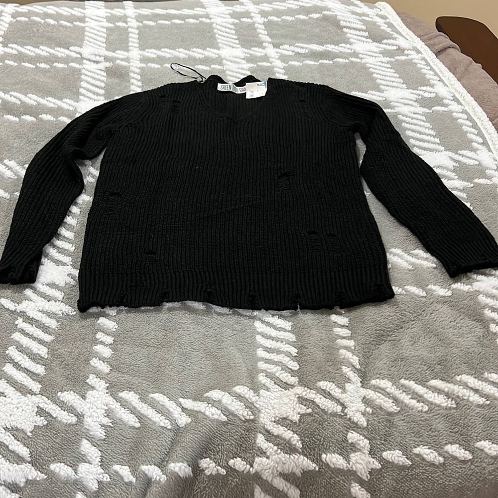 NWT v-neck sweater with stylish rips/holes all over especially the wrists/hem